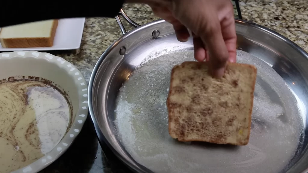 Cooking the coated bread 